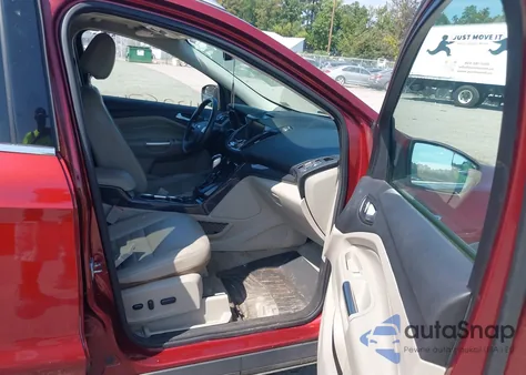 2015 Ford Escape Titanium z USA, uszkodzony, nr VIN 1FMCU9J98FUC14539